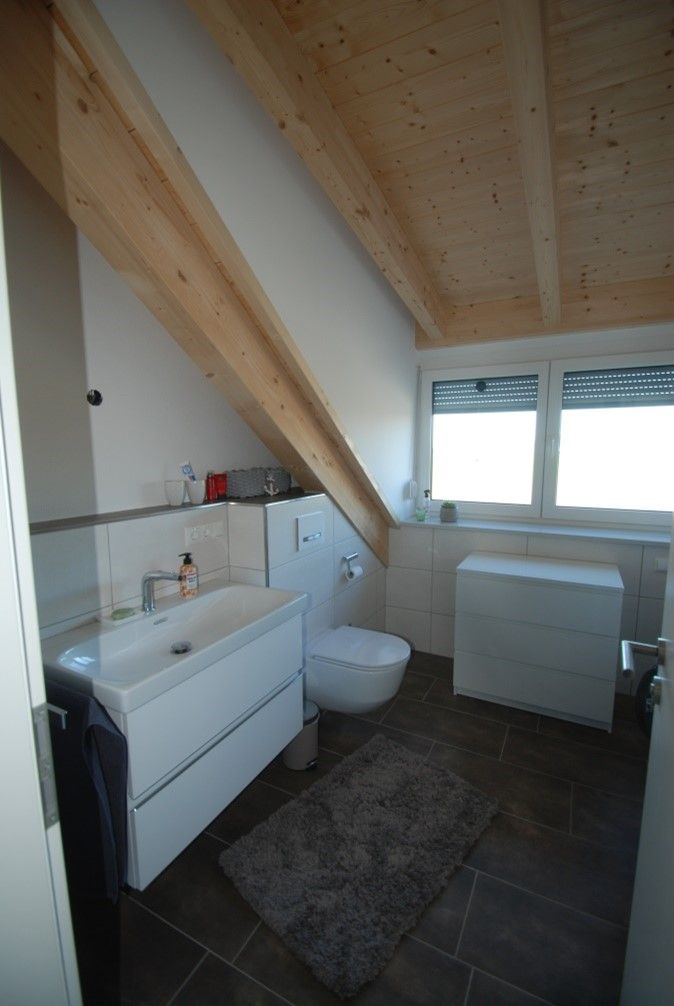 Dachgauben kombiniert mit Sichtdachstuhl bieten eine offene angenehme Wohlfühlatmosphäre auch im Dachgeschoss